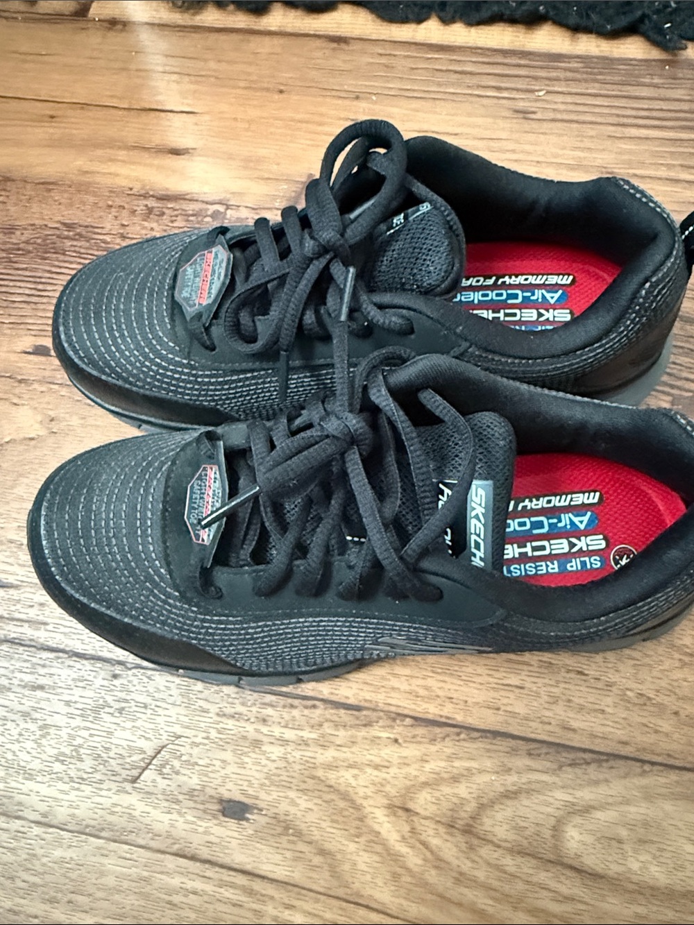 Skechers Black Aluminum Toe work Sneakers with Red Insoles